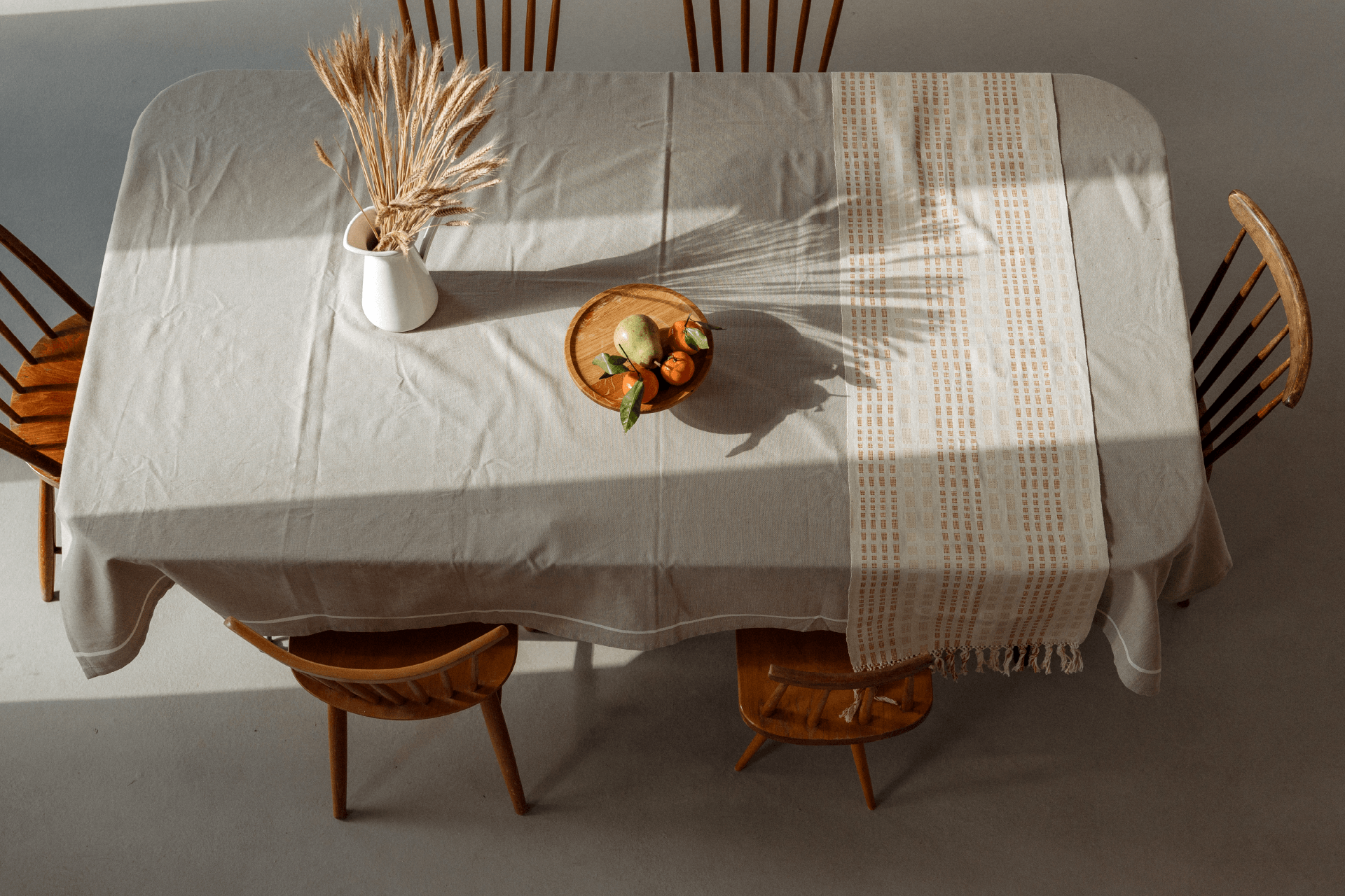 Cotton table runner on cotton table cloth